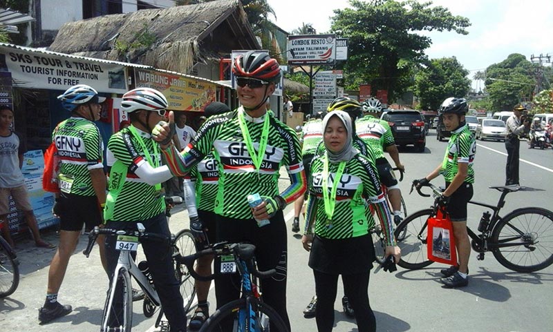 Smiling Bicycle Riders Enjoying Lombok Sporting Events Tourism