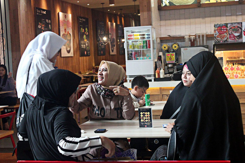 View of Muslim Halal tourists eating at Botani Square Shopping Mall in Bogor, West Java being used as Indonesia Ministry Promotes Halal Tourism to China.